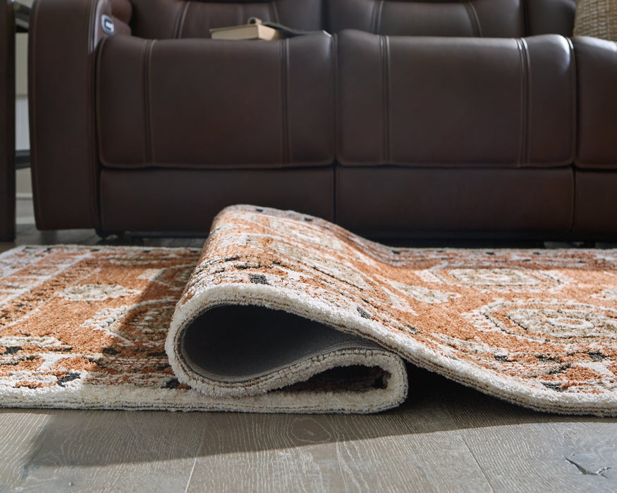 Qaabiz Area Rug